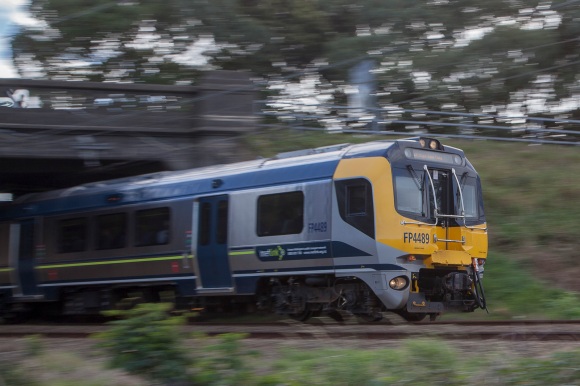 A North bound Wellington commuter train at speed approaching Woburn station